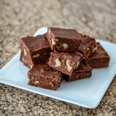 Chocolate fudge on a snack plate.