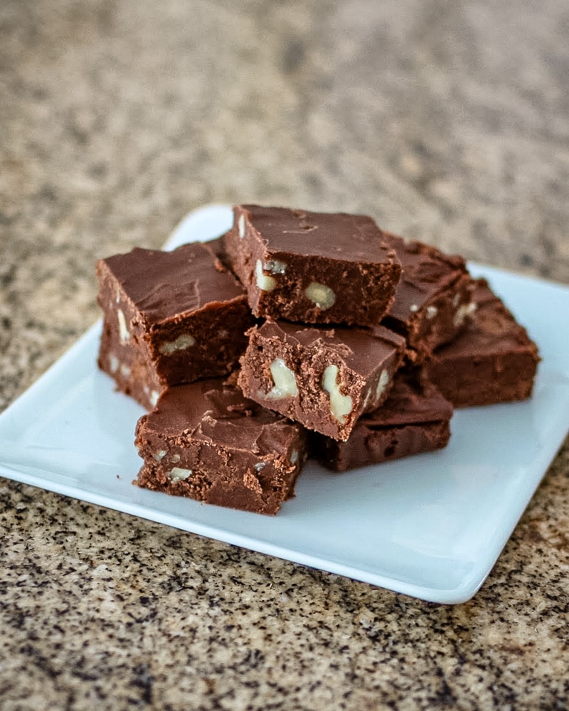 Chocolate fudge on a snack plate.