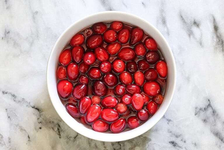 Rinsing the cranberries.