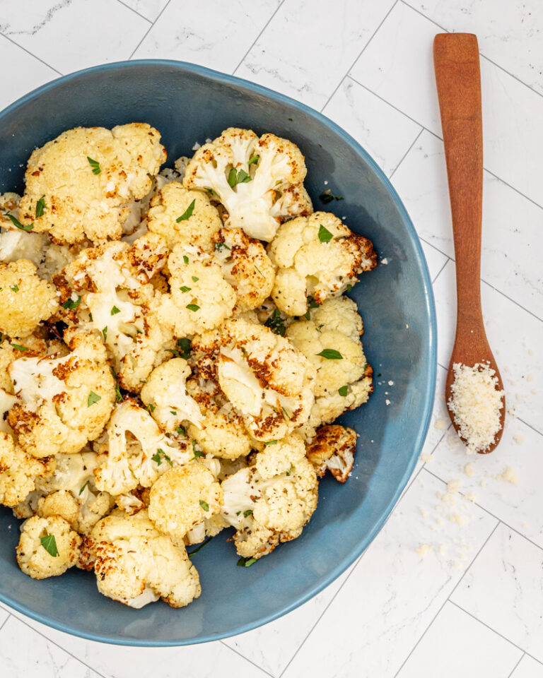 Air fryer roasted caulilflower with Parmesan cheese.