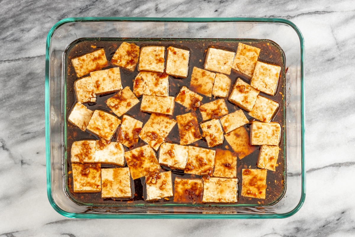 Marinating the tofu for air frying.