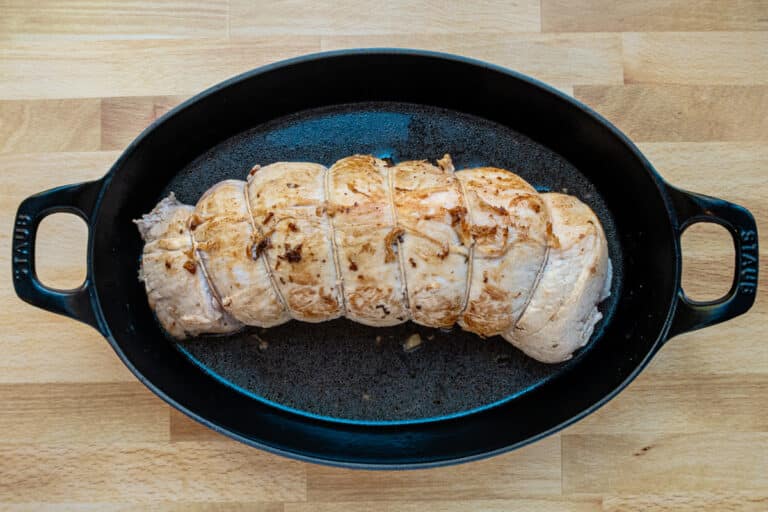 Lightly seared rolled stuffed pork loin.