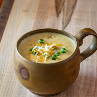 A cup of baked potato soup