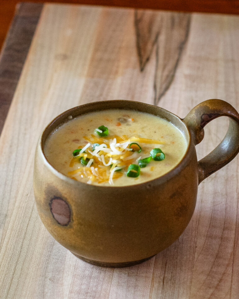 A cup of baked potato soup