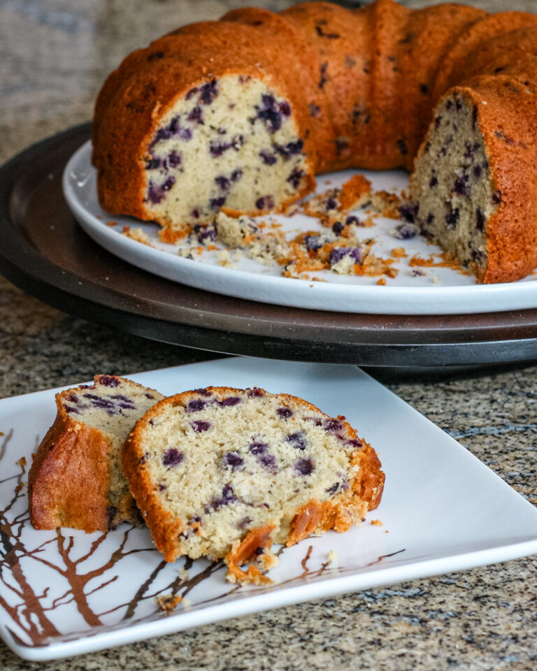 A sliced blueberry bundt cake.