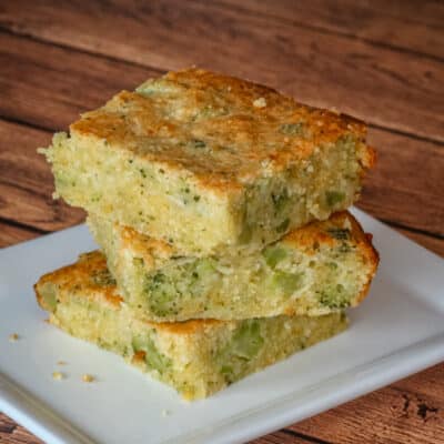 Broccoli Cornbread in a stack on a small plate.