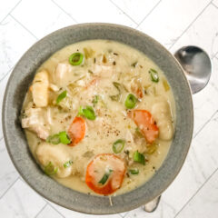 Chicken and dumpling soup with gnocchi dumplings, vegetables, and a creamy chicken broth.