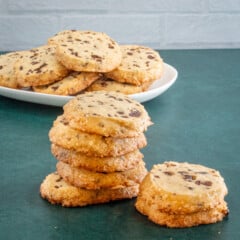 A stack of chocolate chip sablé cookies.