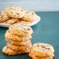 A stack of chocolate chip sablé cookies.