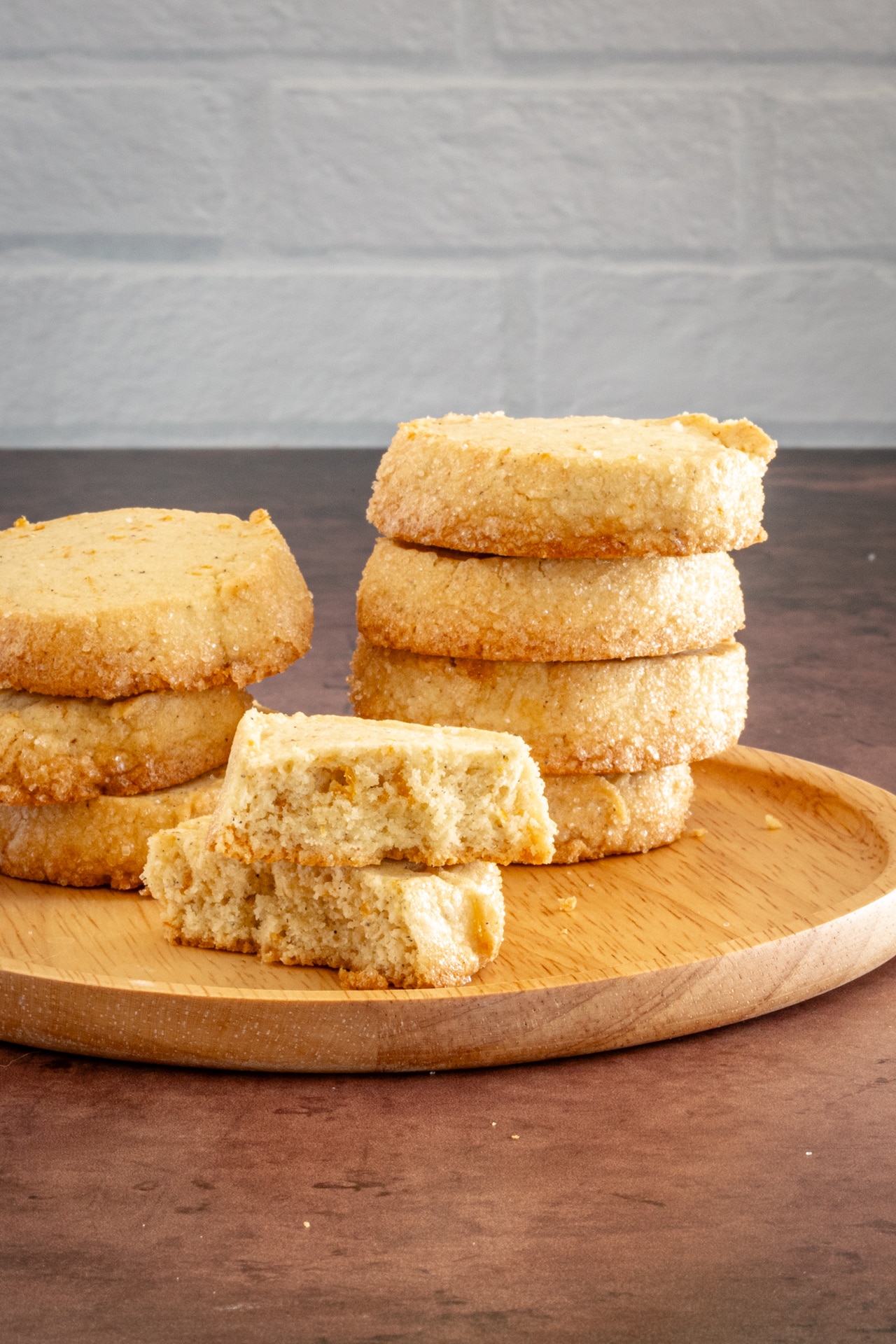 A stack of citrus cardamom sable shortbread cookies.