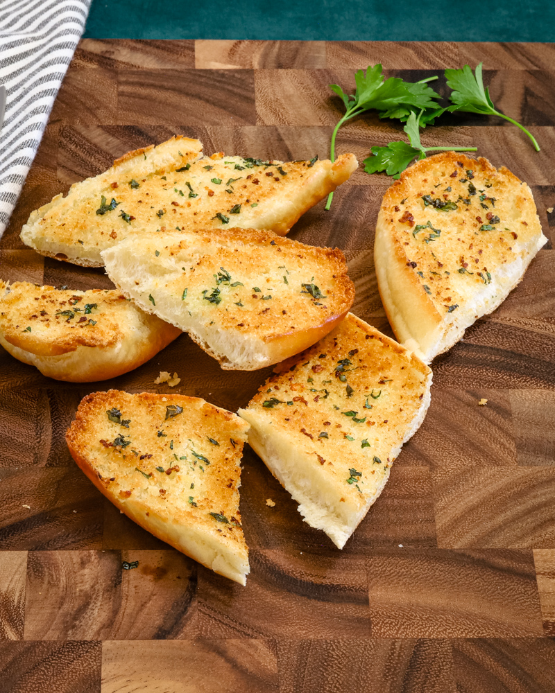 Toasty browned garlic bread made with fresh garlic and parsley.