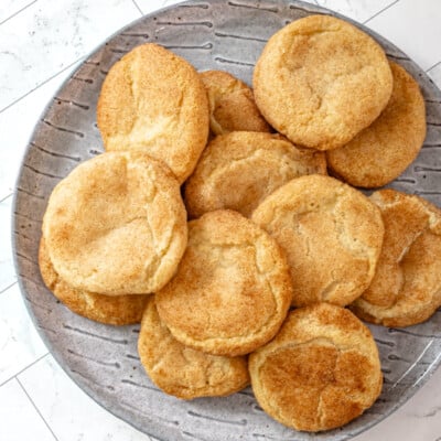 Gluten-free snickerdoodles on a gray plate.