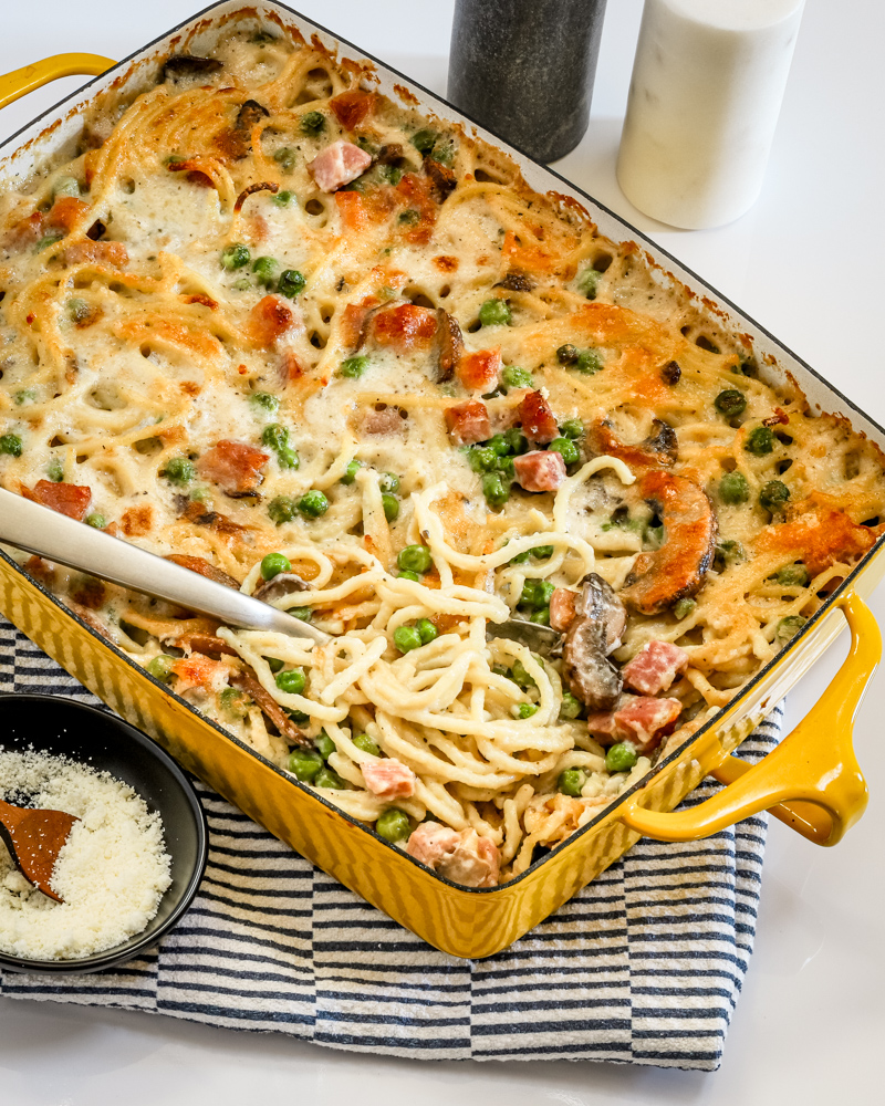 Ham tetrazzini in the baking dish being served.