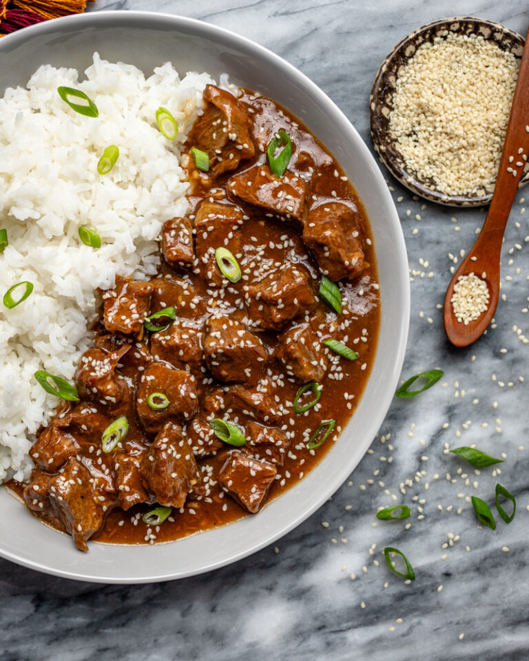 Korean inspired beef and rice in a large bowl.