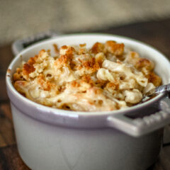 Baked mac and cheese in a n individual casserole.