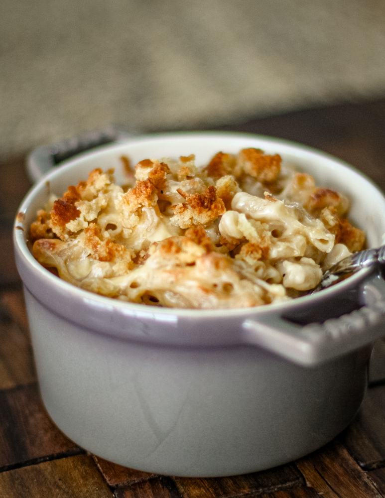 Baked mac and cheese in a n individual casserole.