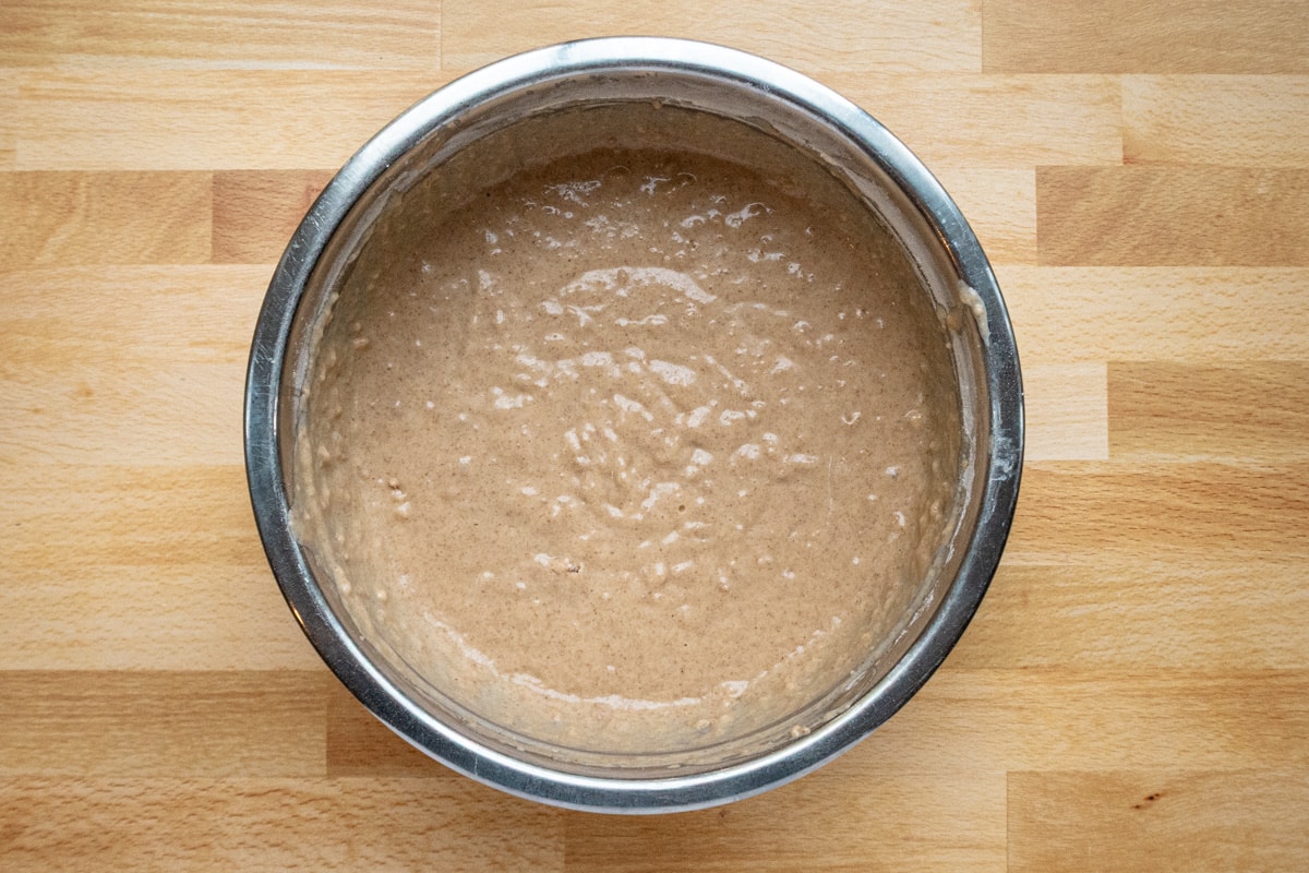 Combining the batter ingredients for snickerdoodle muffins.