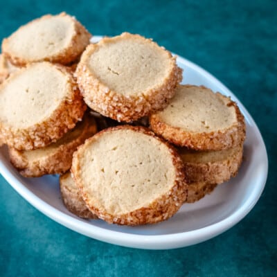 A plate of sable style snickerdoodle cookies.