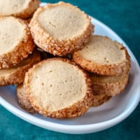A plate of sable style snickerdoodle cookies.