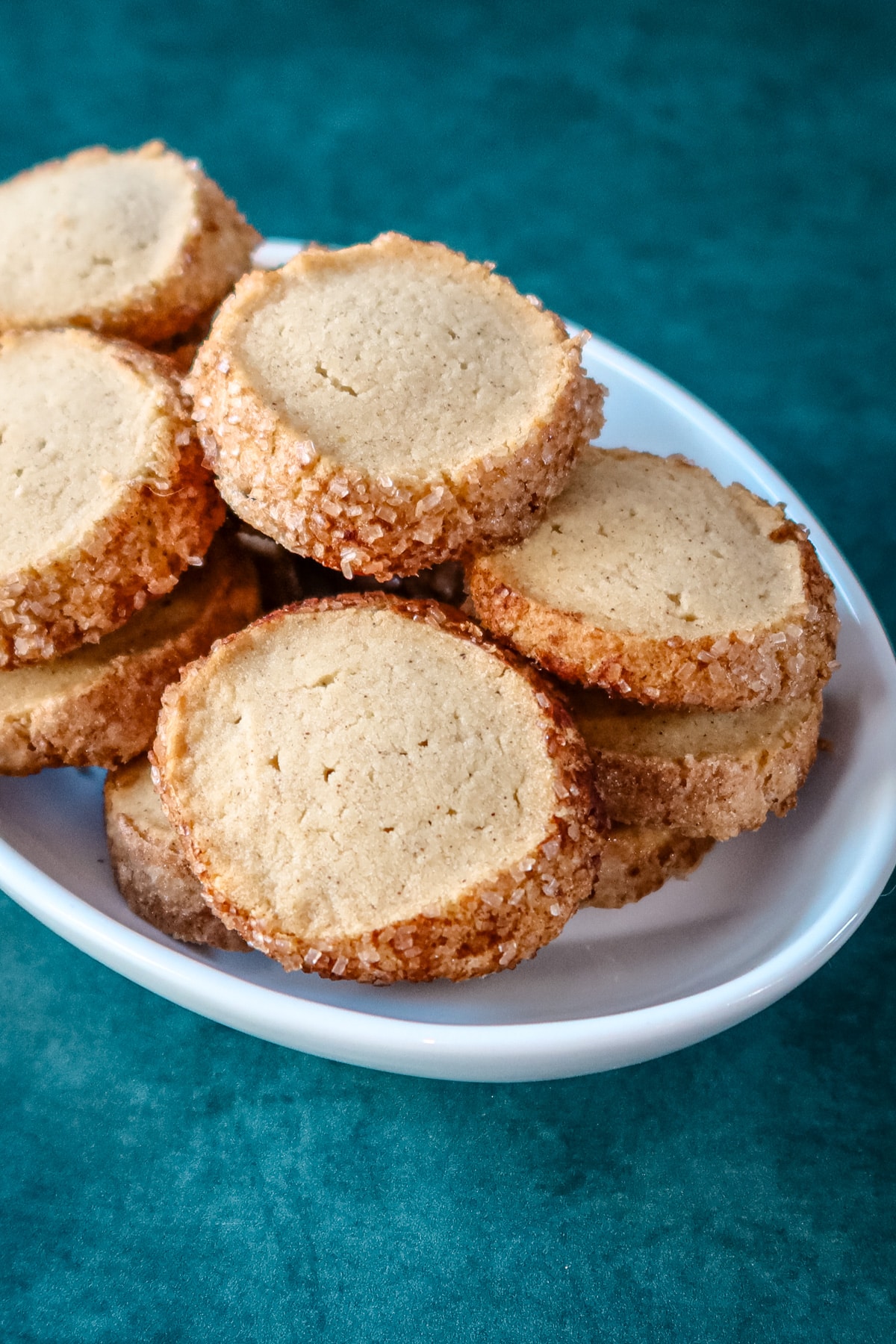 A plate of sable style snickerdoodle cookies.