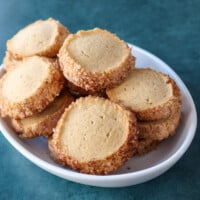 A plate of sable style snickerdoodle cookies.