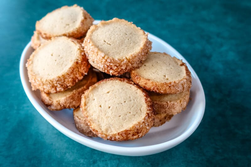 A plate of sable style snickerdoodle cookies.