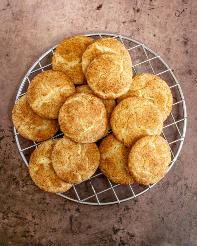 Snickerdoodles on a cooling rack.