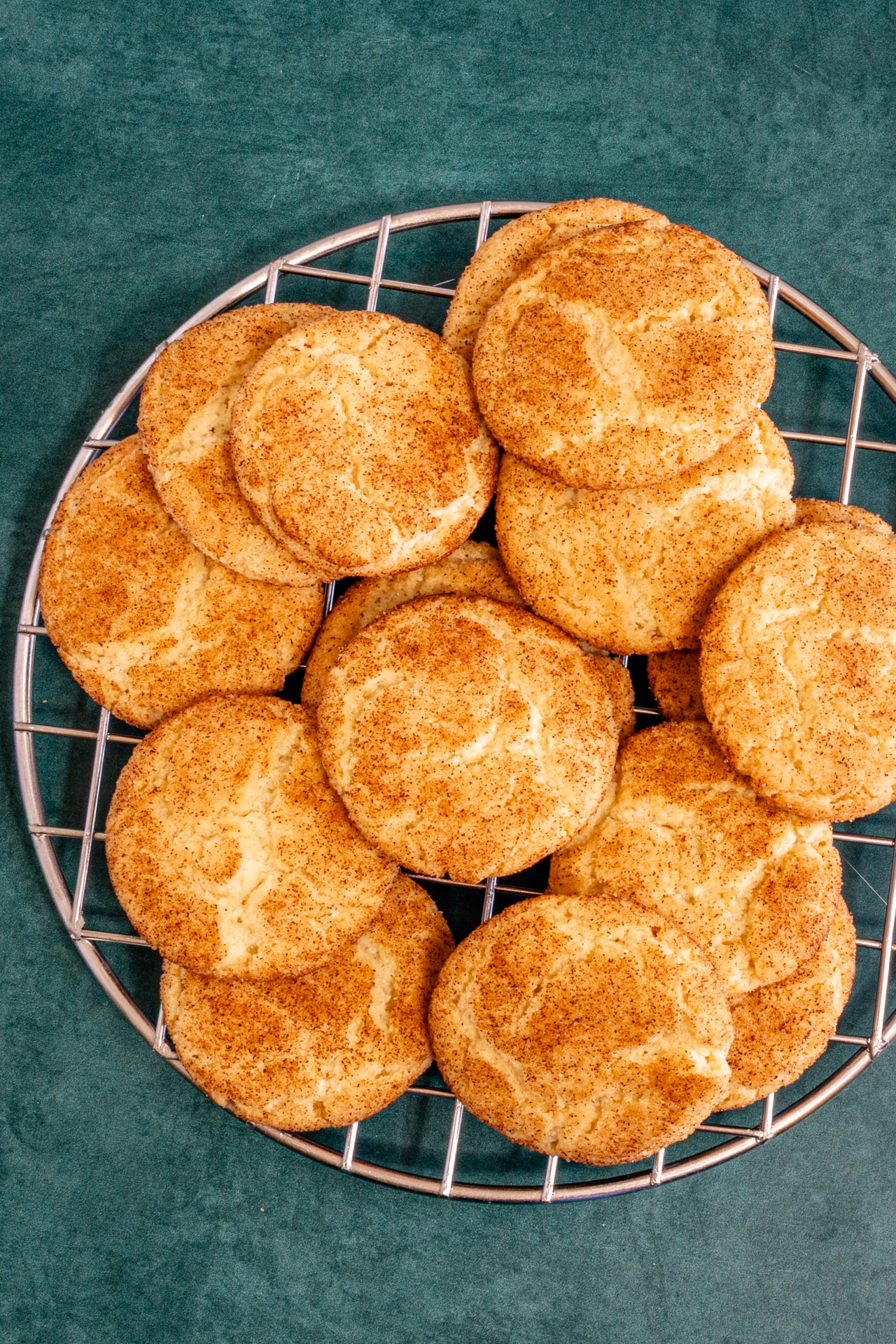 Snickerdoodles on a cooling rack.