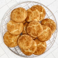 Snickerdoodles on a cooling rack.