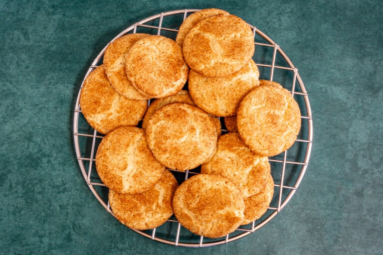 Snickerdoodles on a cooling rack.