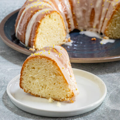 Sour cream lemon cake on a plate.