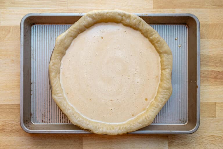 Pie shell filled with chess pie custard filling.