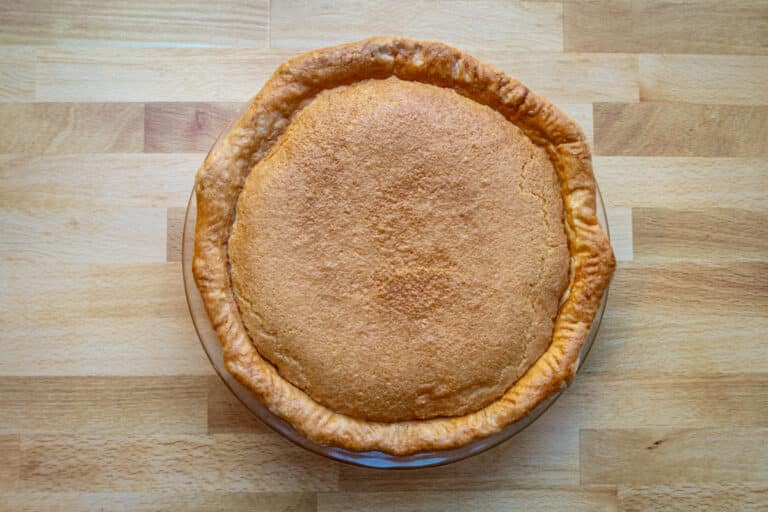 Overhead view of a whole classic chess pie, baked.