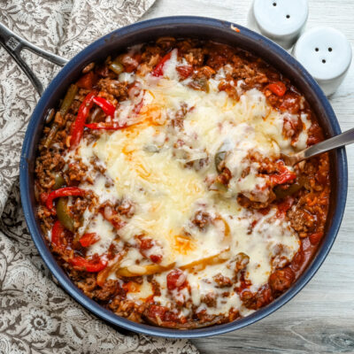 Stuffed pepper casserole with melted fontina cheese, a one pot meal made in a skillet and baked.