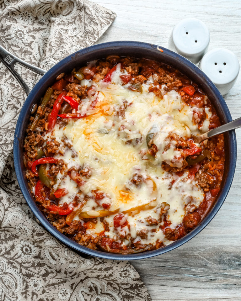 Stuffed pepper casserole with melted fontina cheese, a one pot meal made in a skillet and baked.