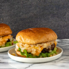 A delicious, buttery Wisconsin butter burger with sauteed onions, lettuce, and cheese.