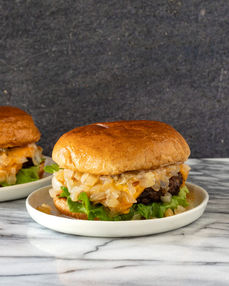 A delicious, buttery Wisconsin butter burger with sauteed onions, lettuce, and cheese.