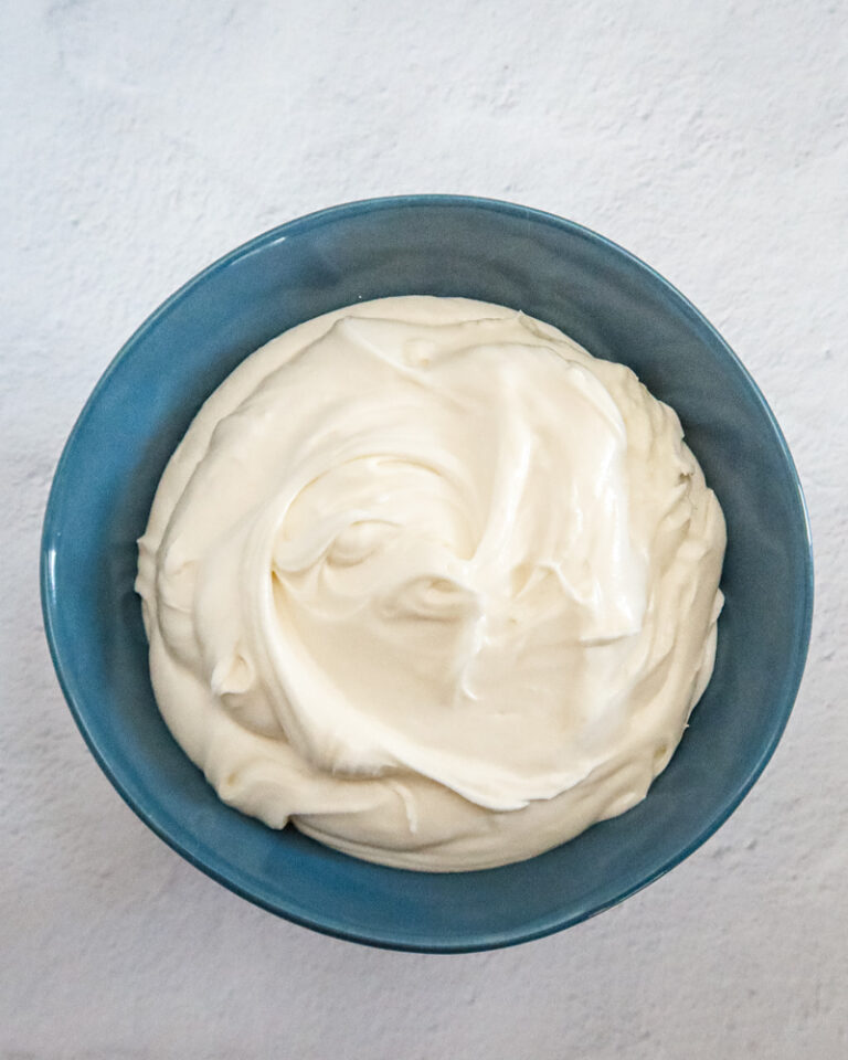 a large bowl with homemade cream cheese frosting
