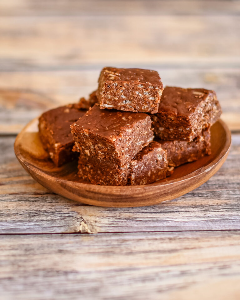 Crispy chocolate fudge on a wooden serving dish.