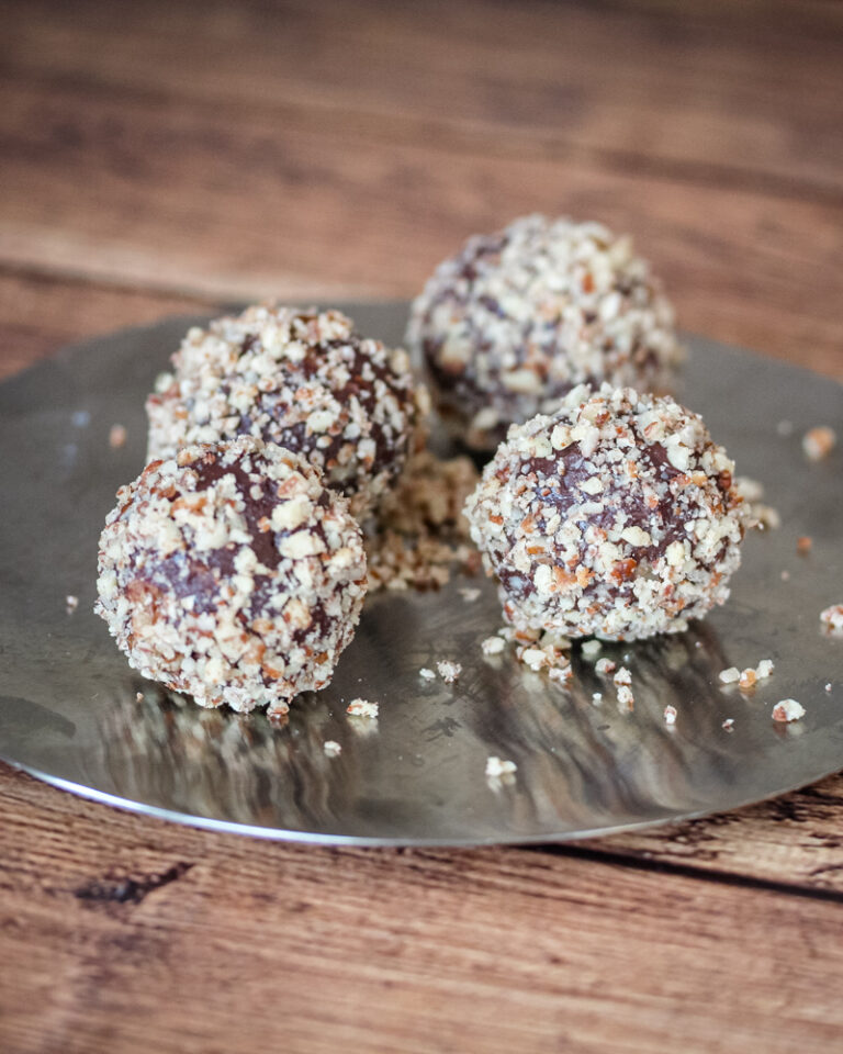 Easy chocolate truffles on a plate.