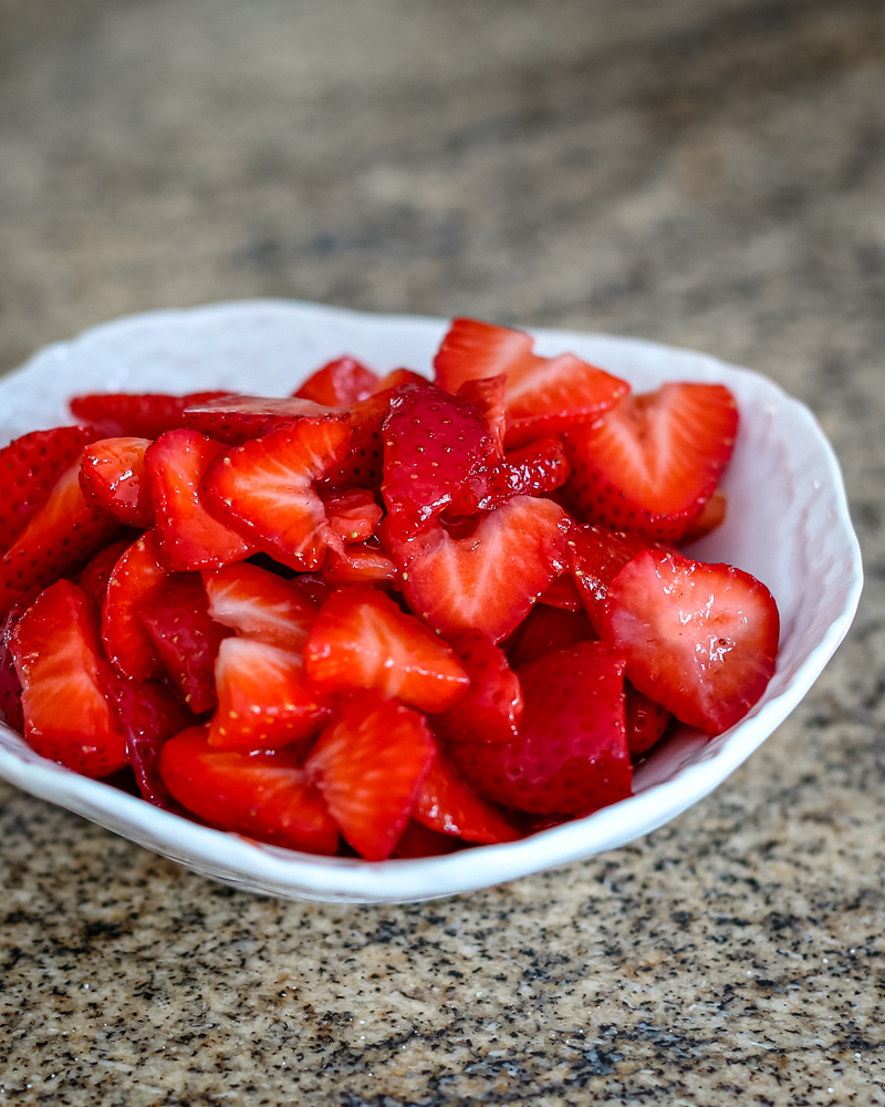 Fresh strawberry sauce in a white bowl