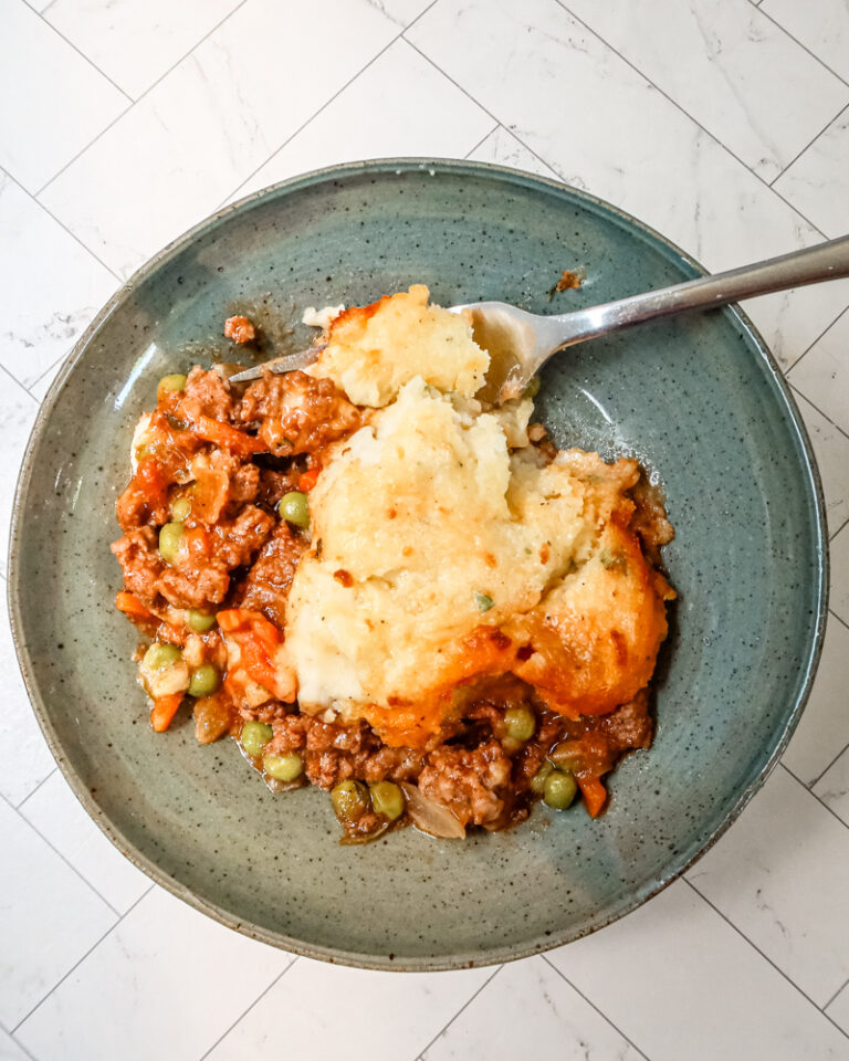 A serving of gluten free cottage pie in a bowl.