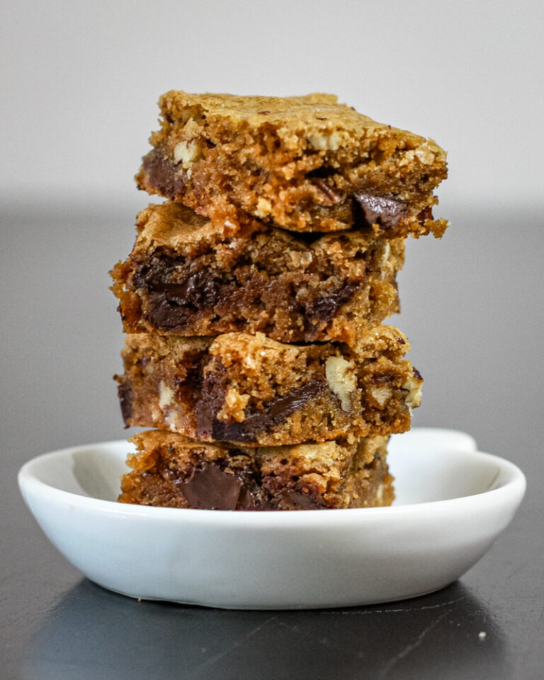 A stack of graham blondies with chocolate chips.