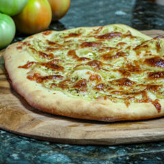 green tomato pizza on homemade crust