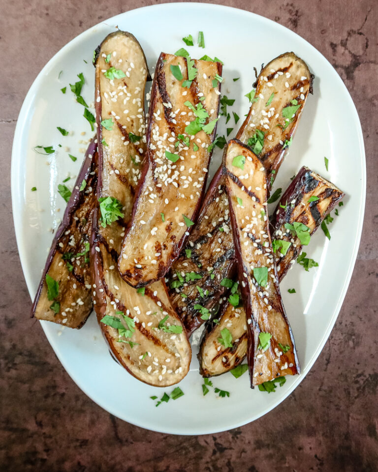grilled chinese eggplant with sesame seeds garnish