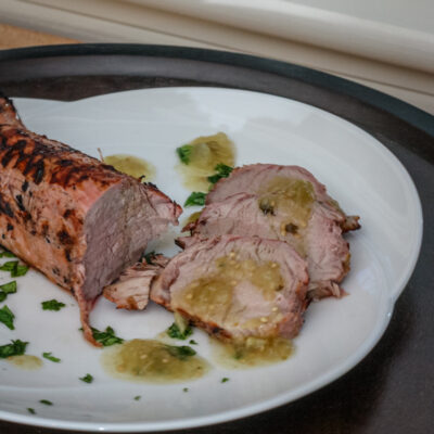 Grilled pork tenderloin with salsa verde.