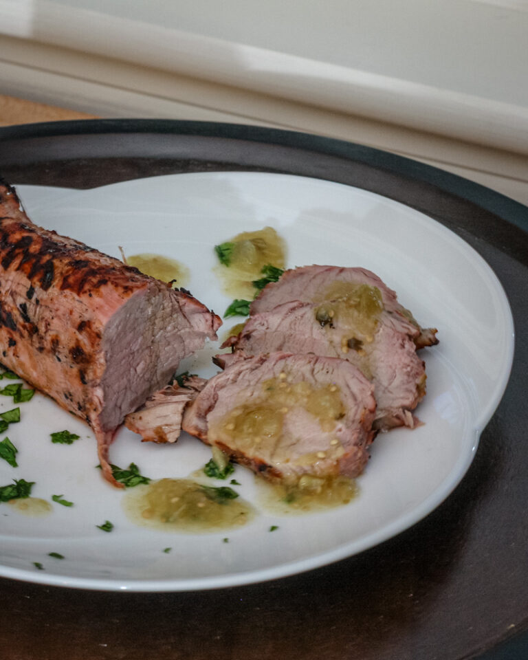 Grilled pork tenderloin with salsa verde.