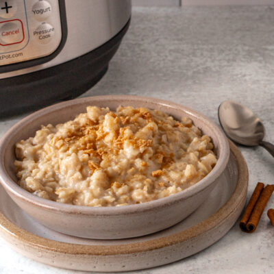 Creamy oatmeal topped with a sprinkle of cinnamon crumbs.