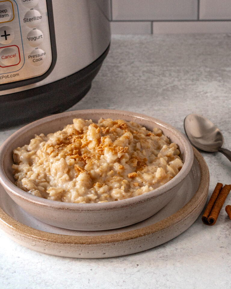 Creamy oatmeal topped with a sprinkle of cinnamon crumbs.