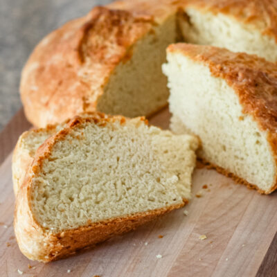 Sliced Irish soda bread on a cutting board.